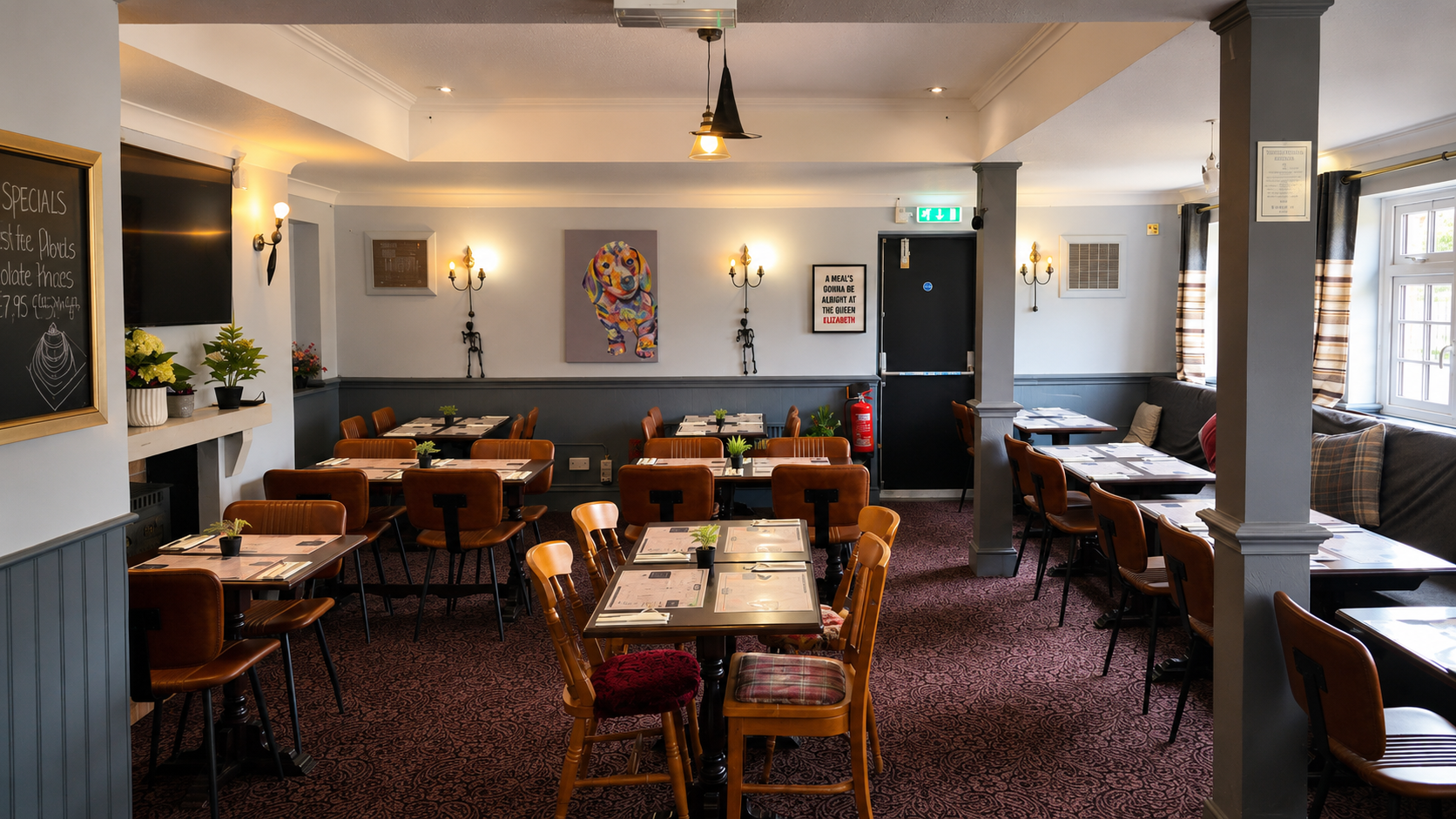 The dining area at The Queen Elizabeth, set for pub classics and Nepalese dishes